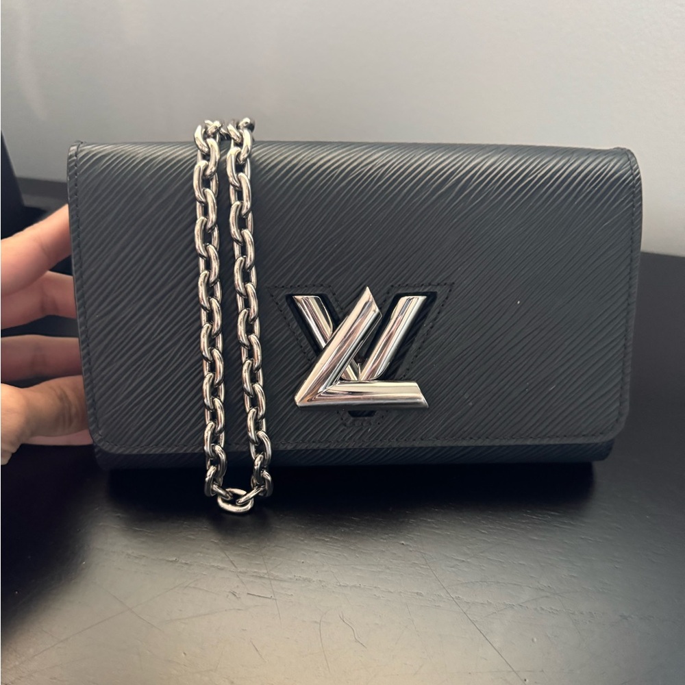 Authentic Louis Vuitton cross body bag.